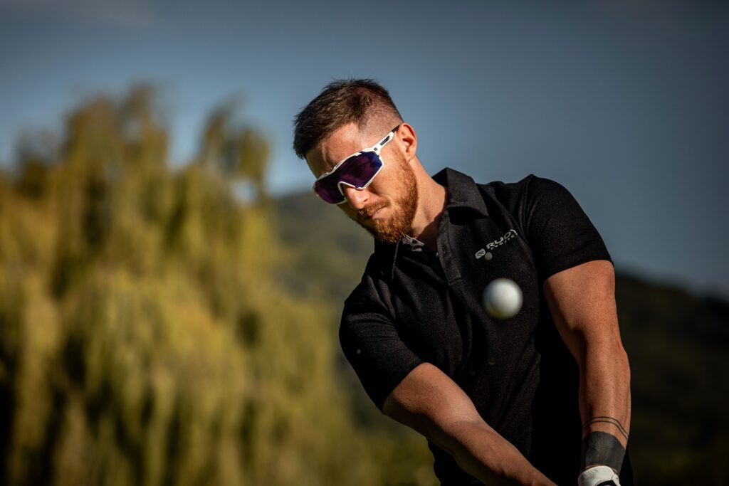 Golfer hitting a ball