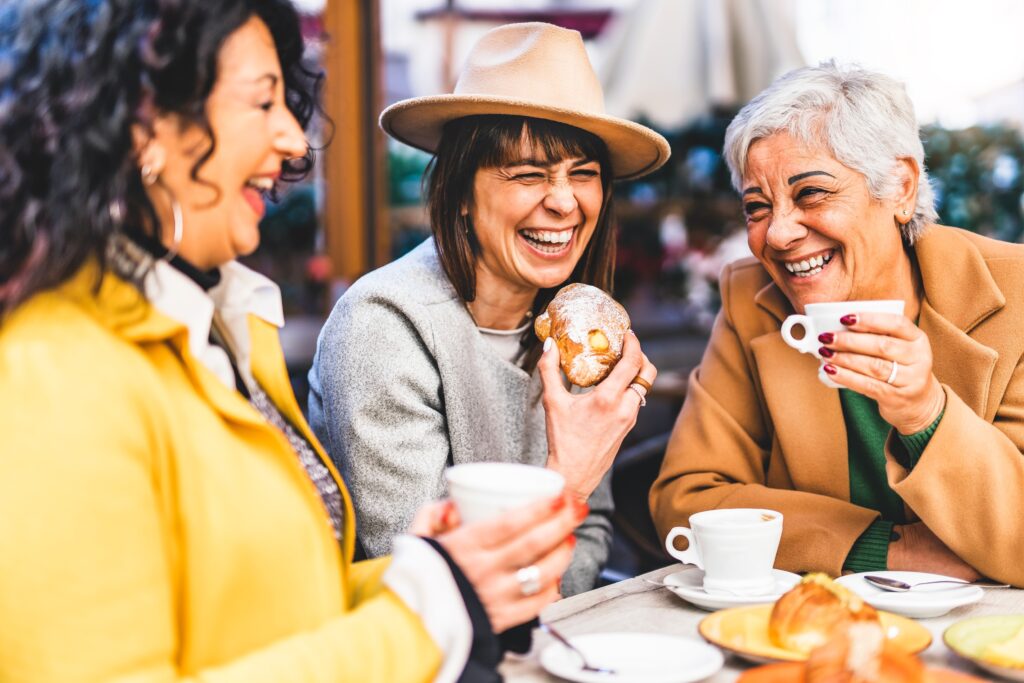 Group of senior women having coffee and pastry