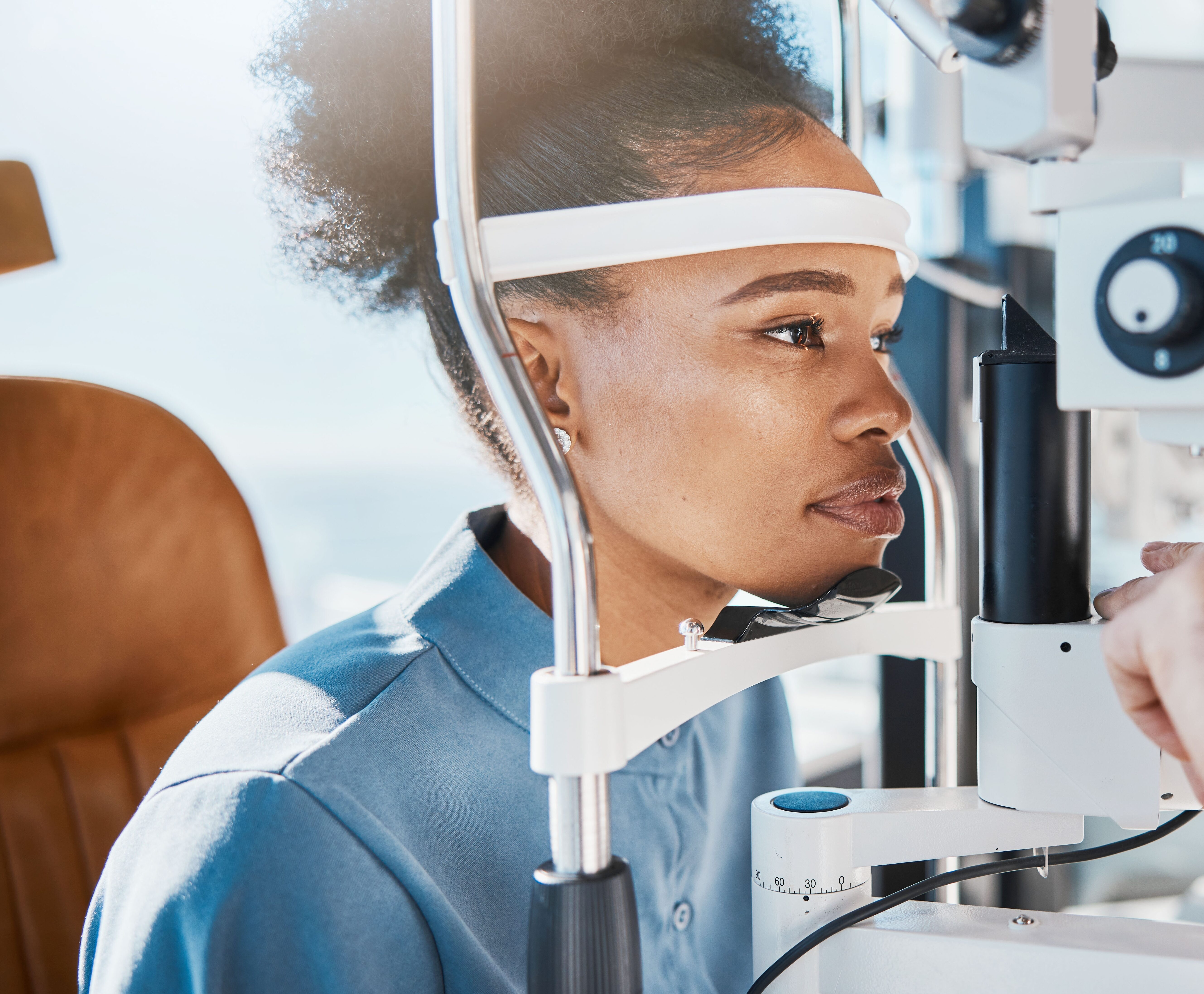Woman having her eyes examined